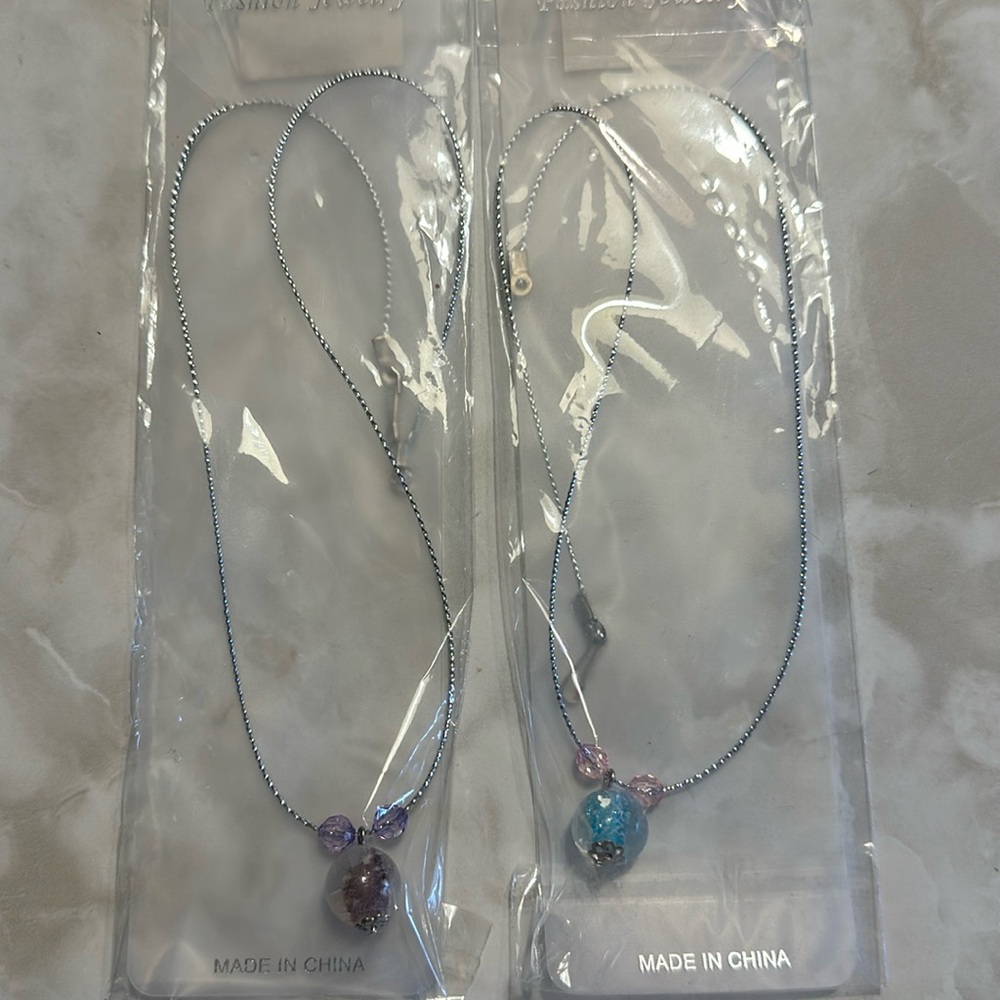 2 necklaces never been worn! 1 blue/pink 1 purple BNDL N SAVE 30%